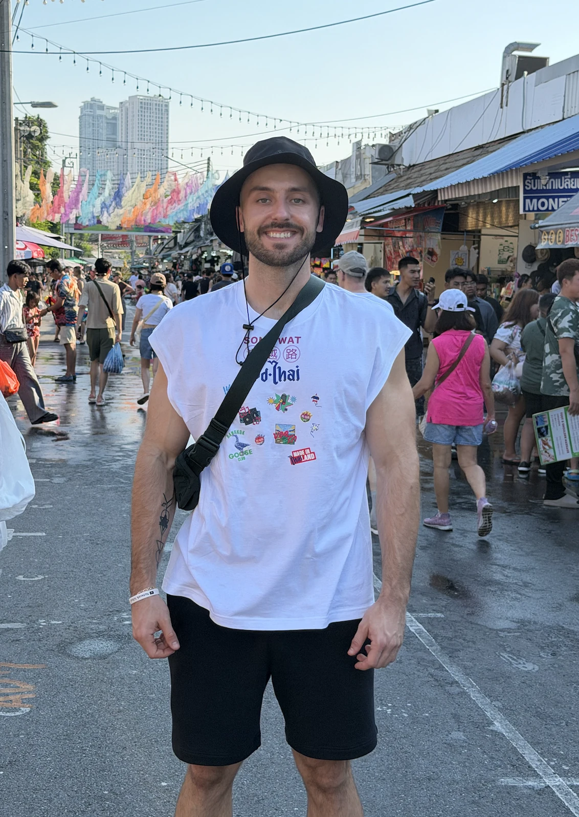 Jake exploring a lively street market in Thailand